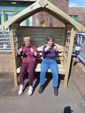 Service users on a bench