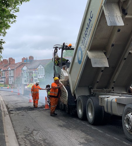 Resurfacing a road